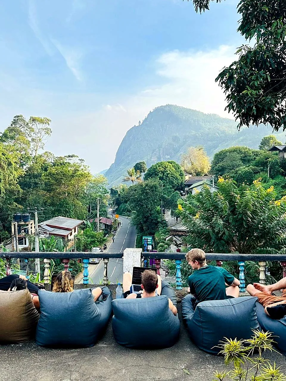 Guests taking in the mountain view from the terrace